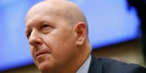 Market Turmoil Lifts Goldman’s Buying and selling, Hurts Dealmaking Enterprise